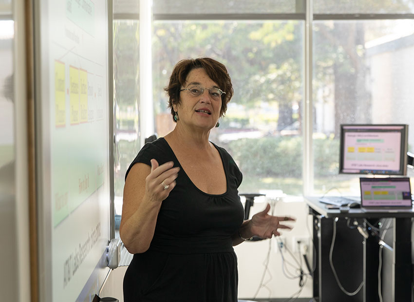 Teacher lecturing in classroom