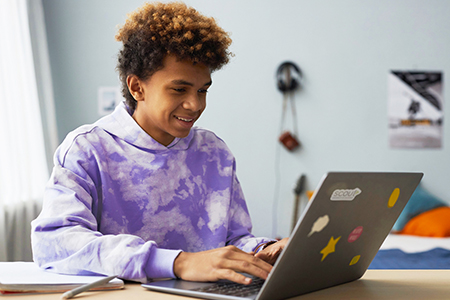 Student working on a laptop